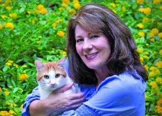 Author Diane Kelly will speak at both Hudson Library and Albert-Carlton Library on Friday.