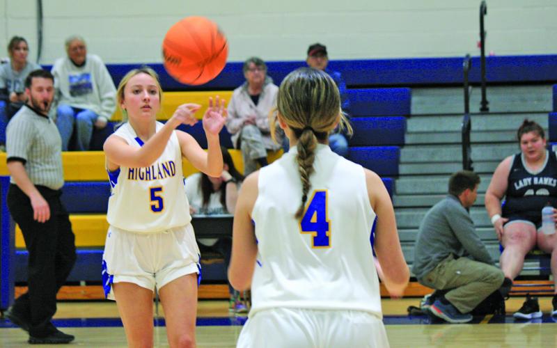 Highlands’ AE Woods (5) makes a pass to teammate Lillian Rutter (4) during a game against Nantahala. Highlands will face Hiwassee Dam in the Little Smoky Mountain 1-A Conference tournament championship on Thursday at Nantahala School.