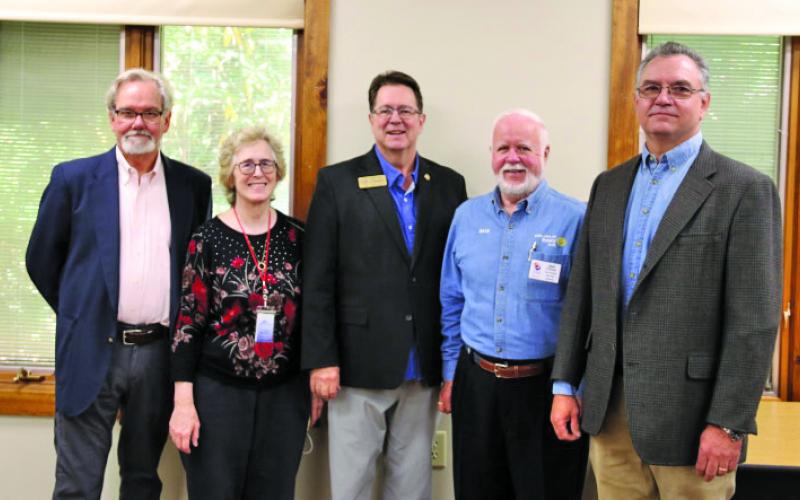Highlands Mayor Patrick Taylor welcomed North Carolina Sen. Kevin Corbin and Rep. Karl Gillespie for a “Coffee with the Mayor” forum on Friday at Hudson Library. Pictured are Taylor, librarian Carlyn Morenus, Sen. Corbin, Rotary Club President Dave O’Hara and Rep. Gillespie.