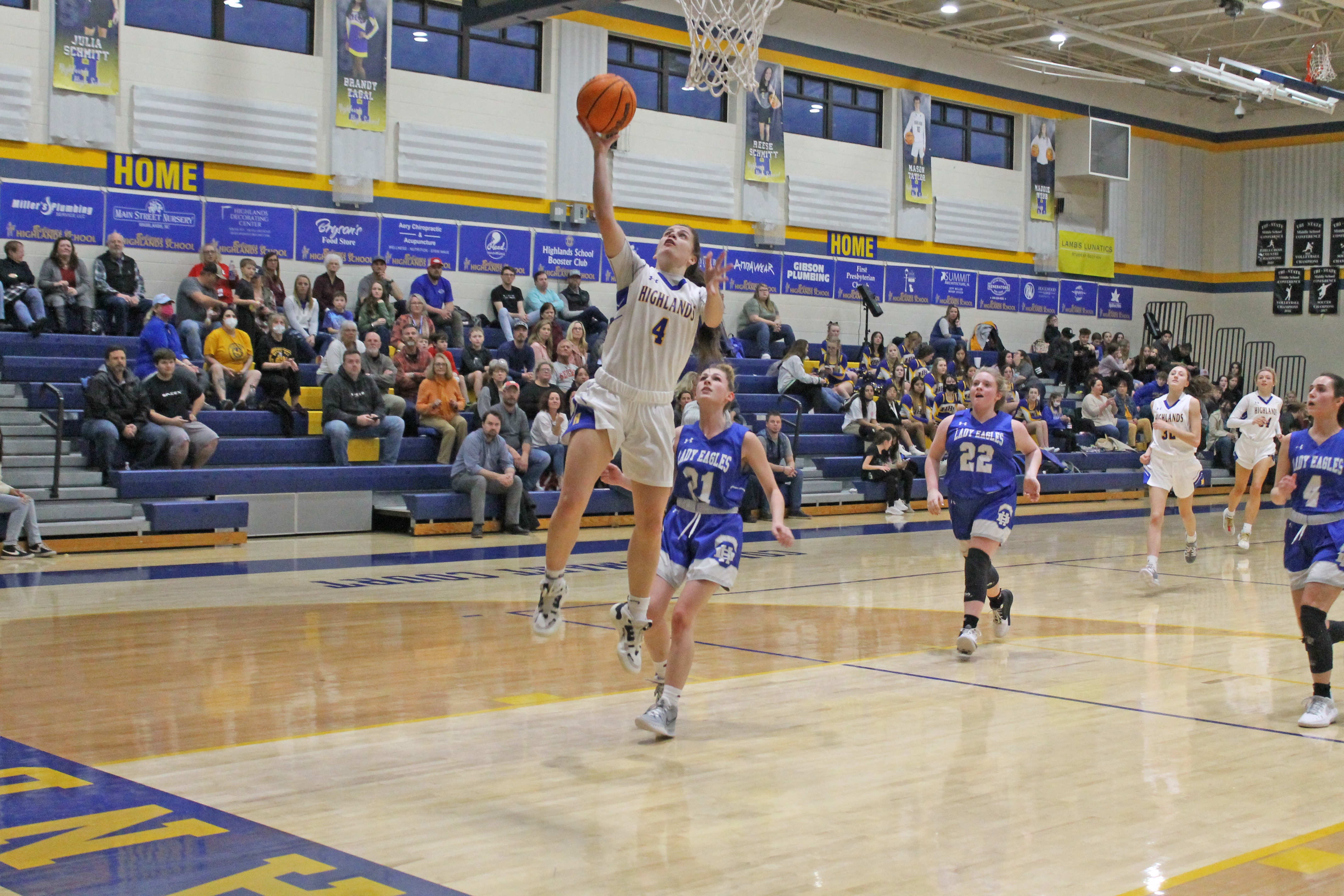 Photo by Christopher Lugo/Staff HHS senior Julia Schmitt goes up for a layup. 