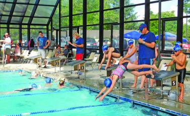 The rec center pool reopening could mean a return to practice for the Highlands Hurricanes swim team.