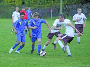 Photo by Christopher Smith/Staff Nathan Keener dribbles the ball against Swain this season. 