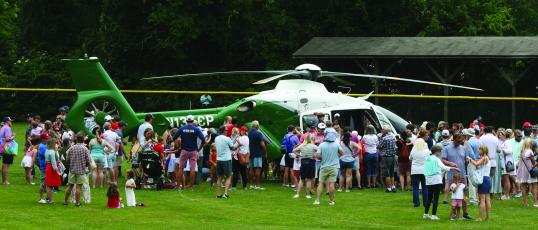 The arrival of the Mountain Area Medical Airlift helicopter was a crowd pleaser during the Highlands Fourth of July Celebration on Tuesday.