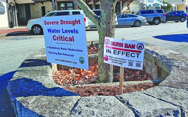 The Town of Highlands has posted signs along Main Street letting people know about water restrictions and the ongoing burning ban.
