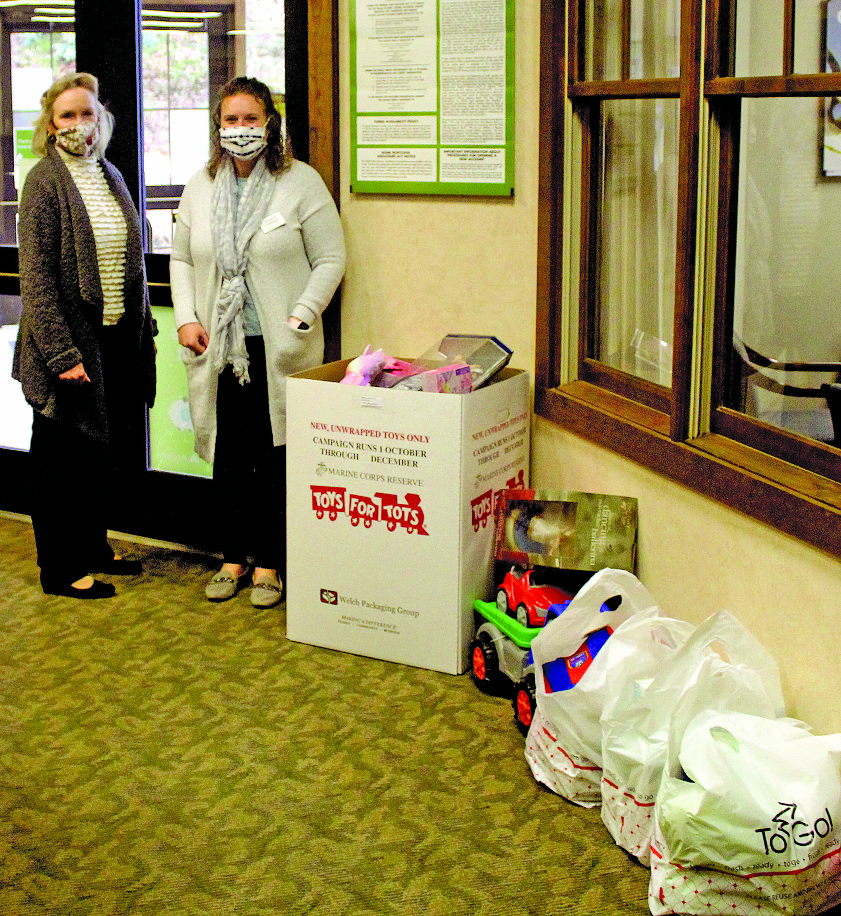 Jacqueline Padzinski and Jessica Ferrell with Regions Bank are accepting toy donations for Toys for Tots for the ninth consecutive year. 