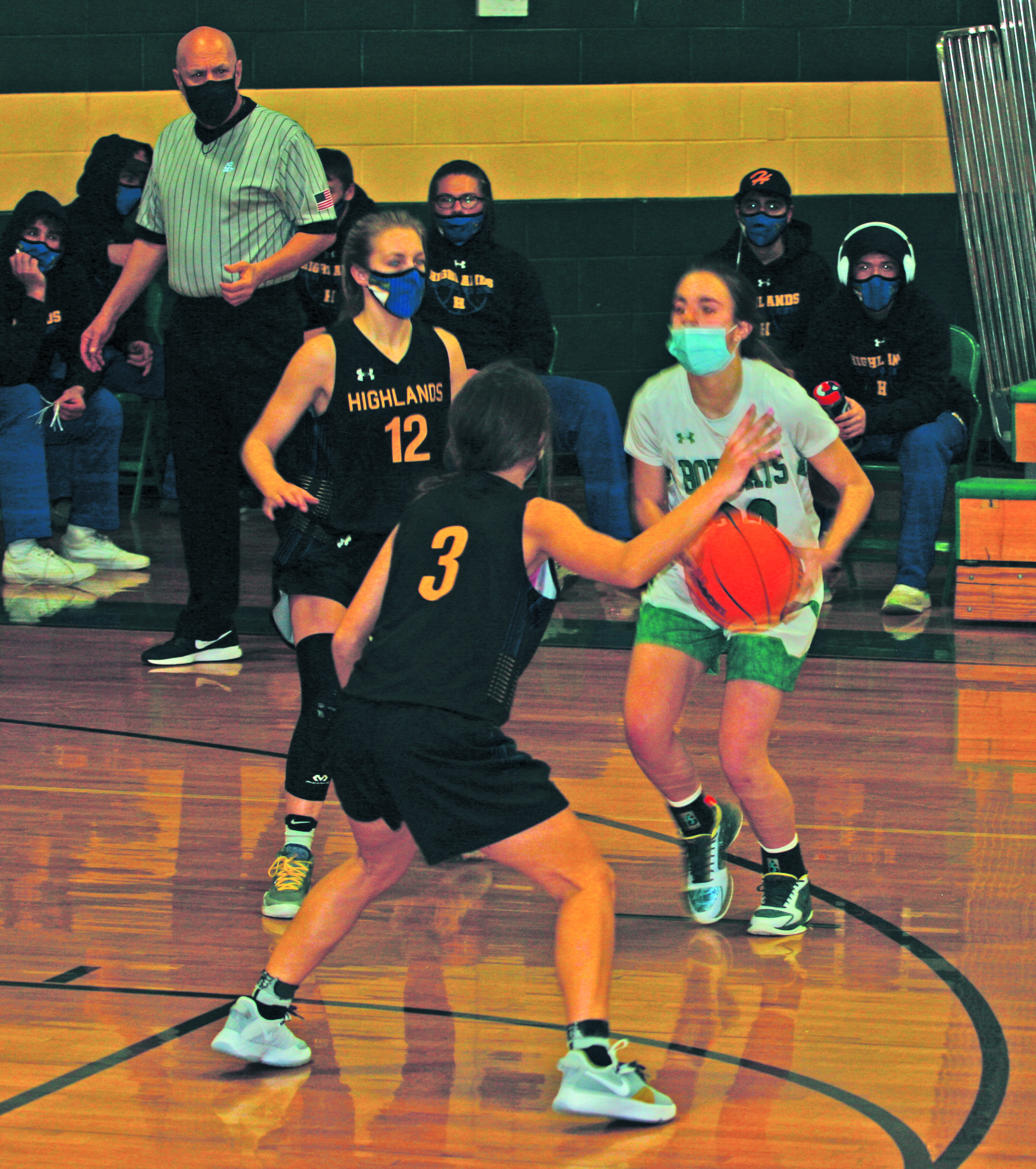 Highlands’ Hayley Borino (12) and Beatrice Bryson (3) swarm to double team Blue Ridge guard Mahalah Stewart (23) during their game at Blue Ridge on Tuesday night.