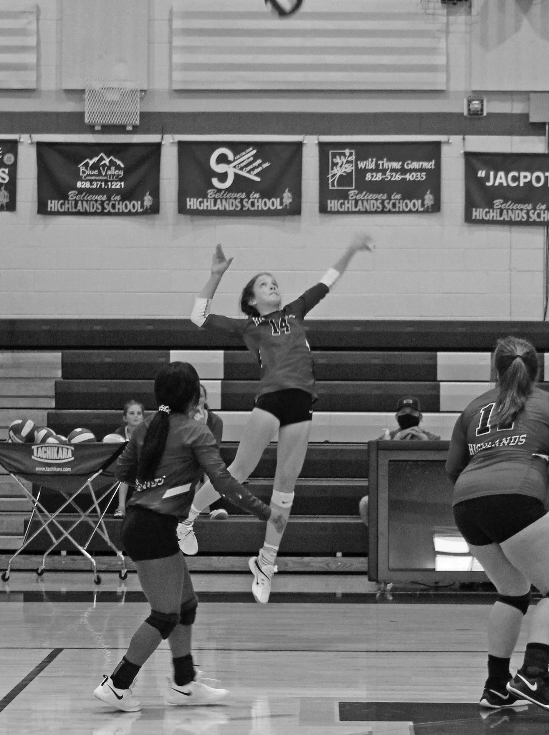 Photo by Christopher Smith/Staff India Clark goes up for a kill against Nantahala. 