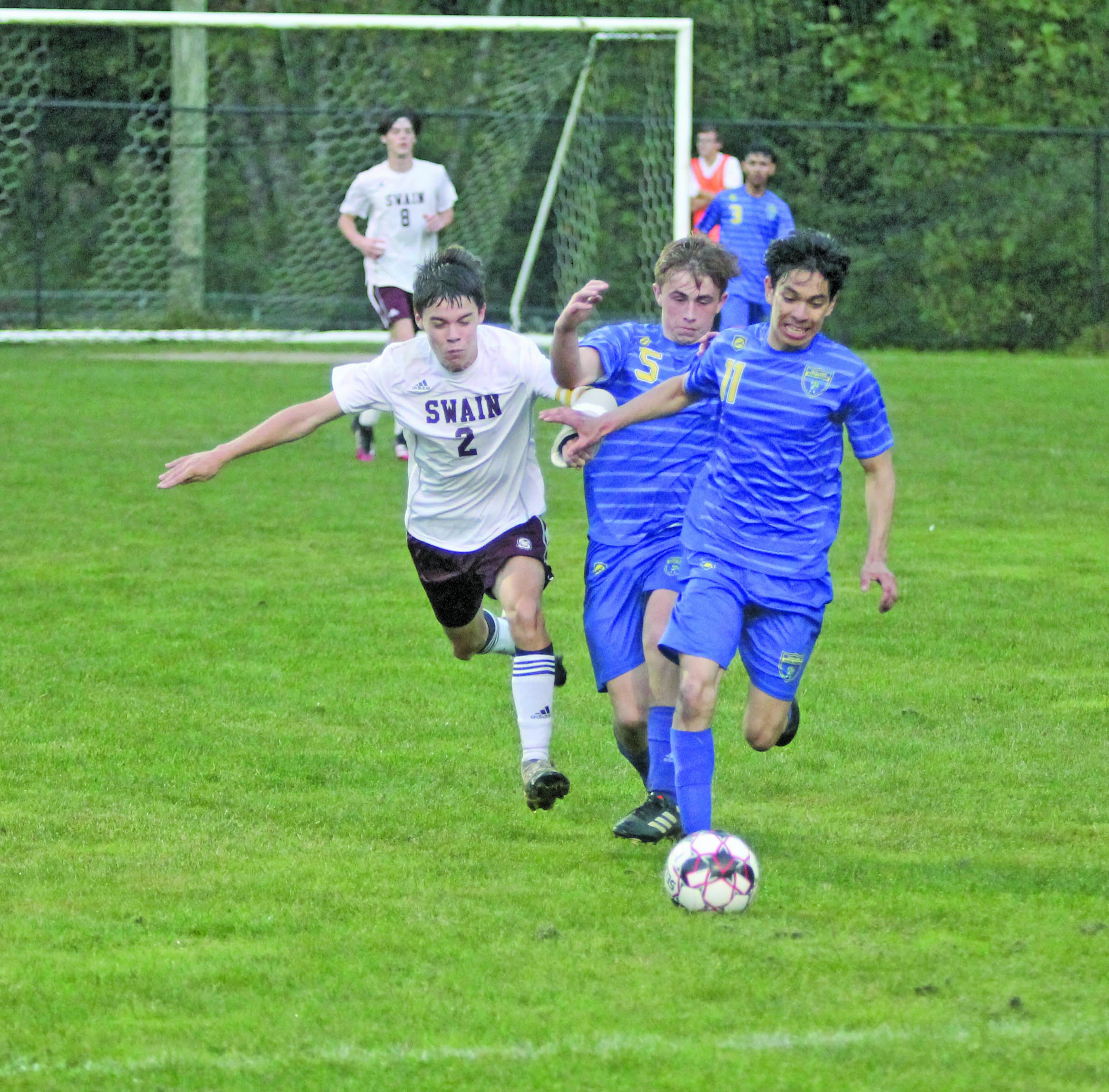 Photo by Christopher Smith/Staff Ronaldo Factor dribbles the ball downfield. 