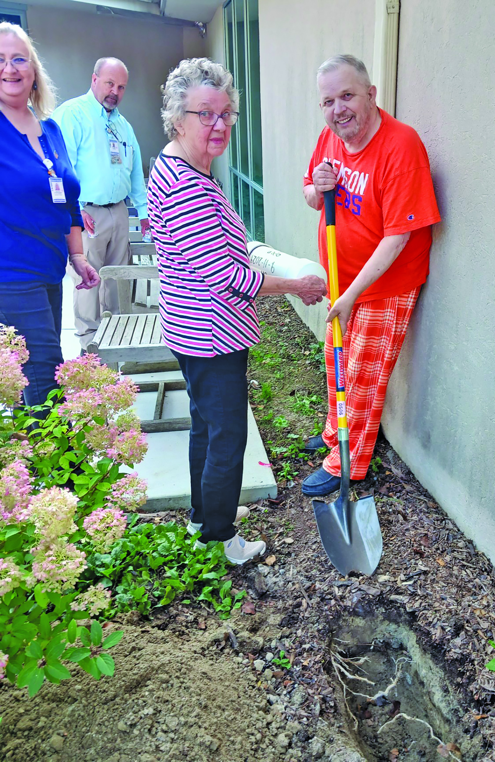 Residents of the Eckerd Living Center buried a time capsule on Sept. 11 with messages for future readers.