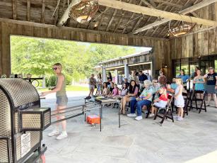 Dillsboro Creative Arts Center’s Annie Jacobsen shapes glass using repurposed energy at last year's event. The Bascom will host Community Day on July 3 starting at 11 a.m. Photo courtesy of The Bascom