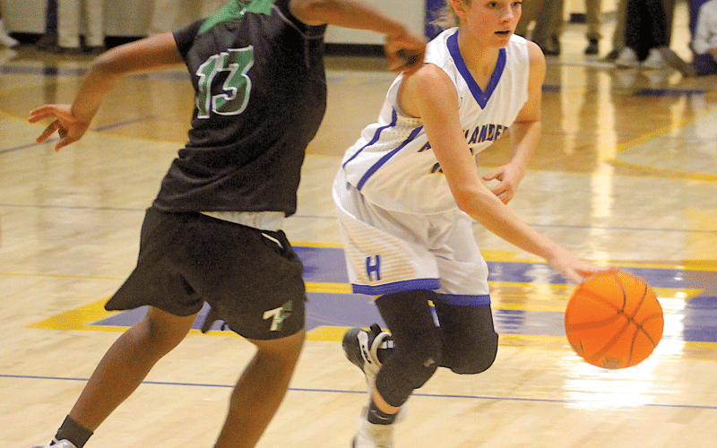 Highlander sophomore Hayley Borino drives the ball up court against visiting Tallulah Falls in Highlands’ 64-49 season opening win on Tuesday. Borino’s 18 points led all scorers.
