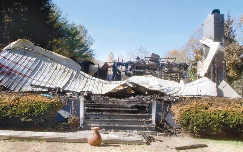 A southern Jackson County couple’s Friendship Lane home of 26 years is a pile of charred debris Friday following a fire there the previous week. They also lost most of their possessions in the Oct. 26 blaze. (Photo by Don Richeson.)