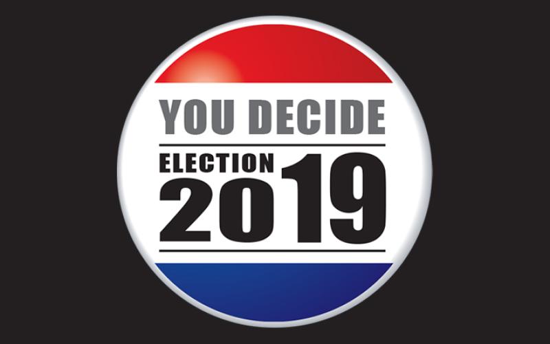 Commissioner race too close to call