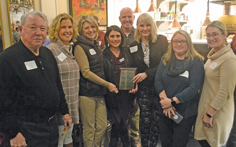 Highlands Chamber of Commerce board chair Hillary Wilkes presented the Robert B. Dupree Community Service Award to representatives of the Highlands-Cashiers Health Foundation during the 2019 Chamber Awards Banquet.