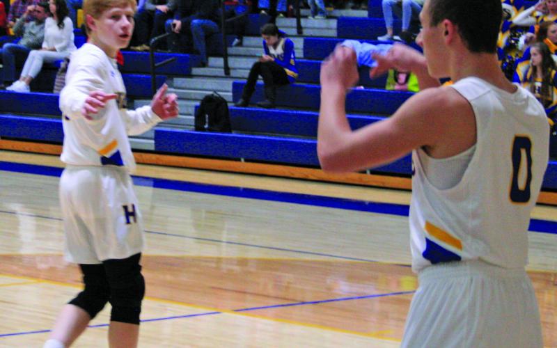 Connor Briggs inbounds the ball to Brent Sleight during the Highlanders 60-58 win over Robbinsville.