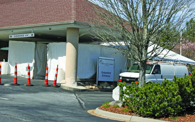A training tent has been set up outside Highlands Cashiers Hospital. The tent is being used for staff exercises related to treating potential COVID-19 patients.