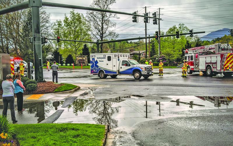The ambulance carrying fallen Glenville-Cashiers Rescue Squad member Eldon Jamison rolled slowly through the Cashiers crossroads on its way to the Glenville station.