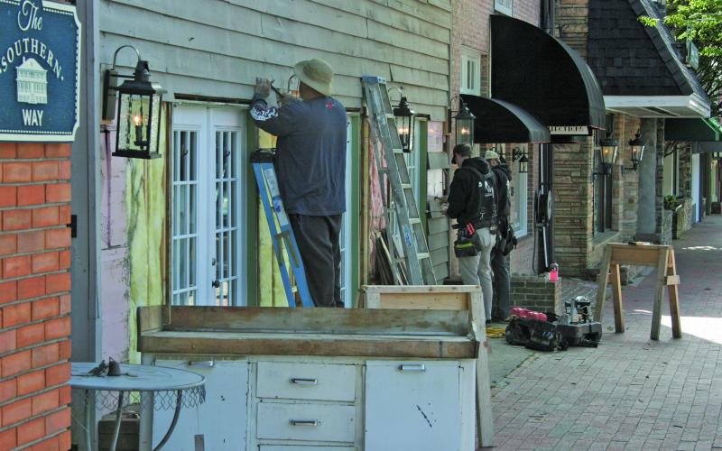 Work was underway at several businesses in Highlands on Wednesday morning. Retail shops will be allowed to reopen as of 5 p.m. on May 8.