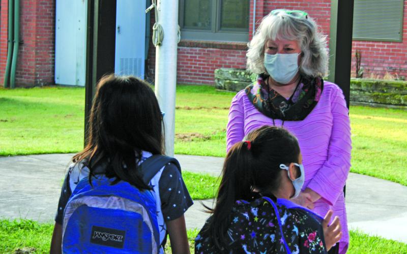 Highlands School administrators and staff members greeted elementary school students outside on Monday for the first day of in-person classes during the 2020-21 school year.