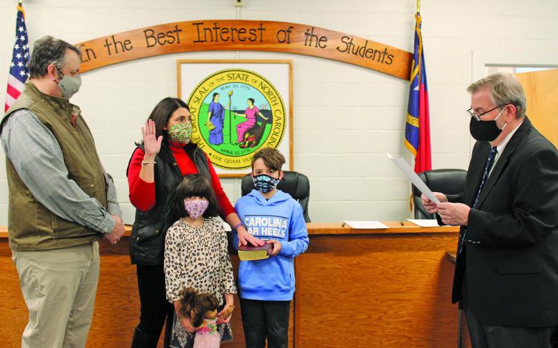 Hilary Wilkes takes her oath of office on Monday before joining the Macon County Board of Education as the board’s Highlands representative.