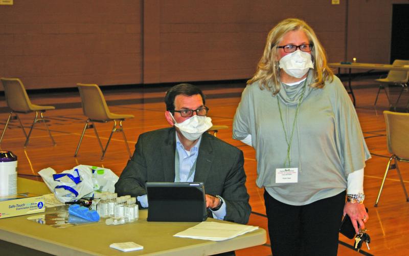 Highlands Rec Center served as the host site for the first round of public COVID-19 vaccinations in Highlands on Wednesday. Highlands-Cashiers Hospital CEO Tom Neal and vaccination clinic volunteer Robin Neal greeted the clinic’s first patients.