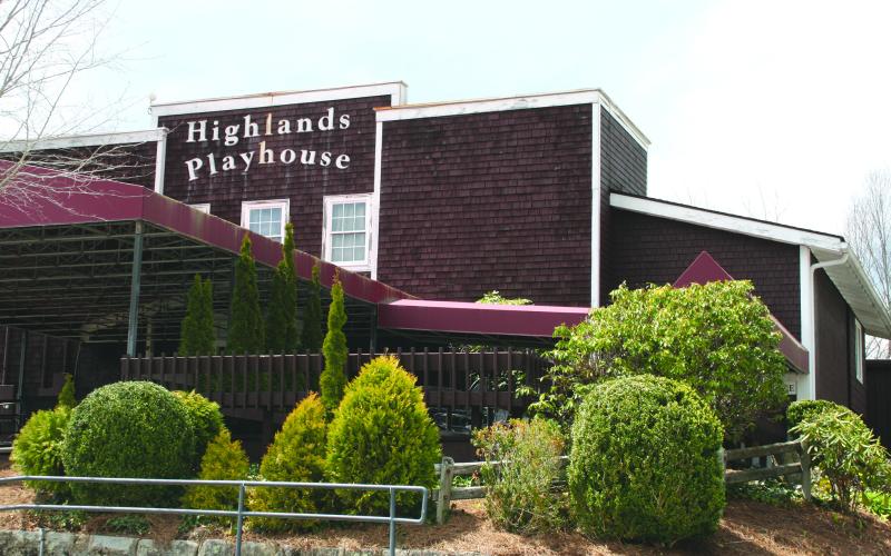 A grounds crew from Highlands Falls Country Club took time out to spruce up the exterior of Highlands Playhouse in March.