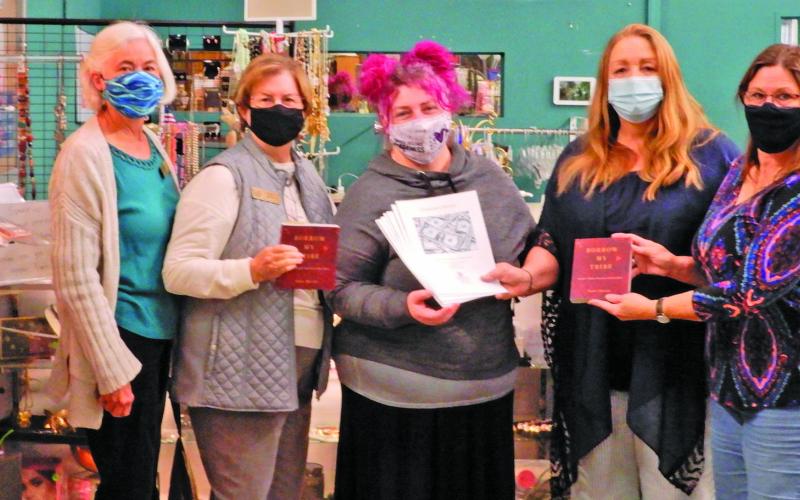 Pictured are Zonta board members Linda Tyler and Peggy Milton, Jennifer Lynn Turner from REACH, and Zonta board members Roxanne Chambless and Deanna Wagner.