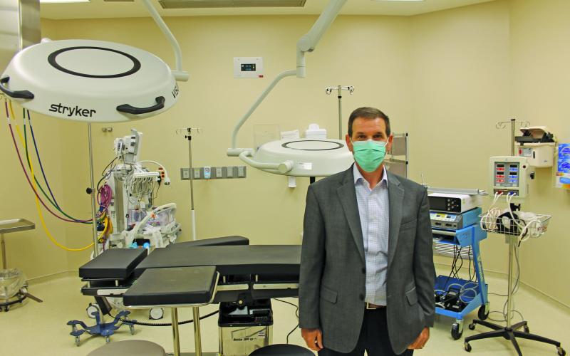 Highlands-Cashiers Hospital CEO Tom Neal stands in one of the two new operating rooms.