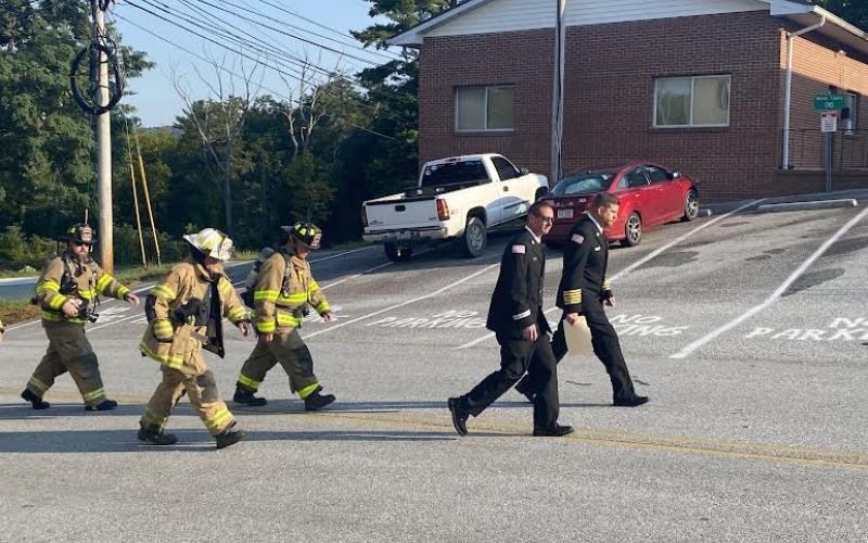 Photo by Christopher Smith/Staff Highlands Fire and Police Department, along with veterans and locals all walked in honor of the fallen.