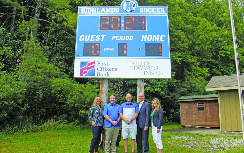 Photo by Christopher Smith/Staff First Citizens Bank and Old Edwards contributed $5,000 each for the new scoreboard.