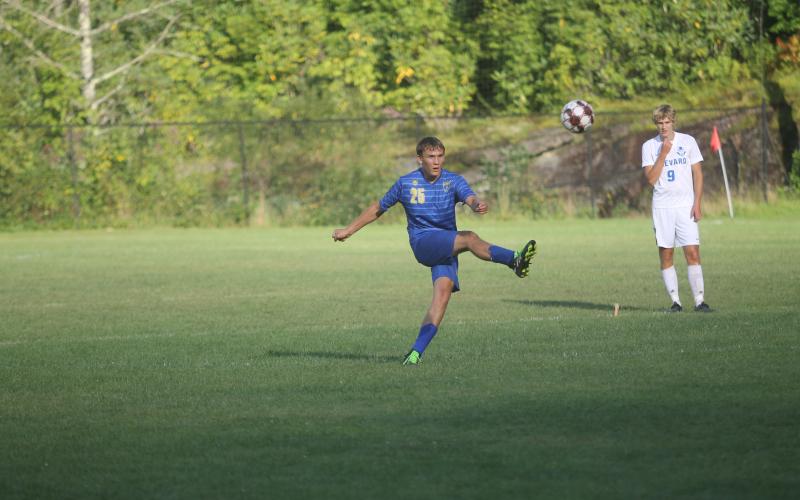 Photo by Christopher Smith/Staff James Earp tries to take the ball away from a Brevard forward.