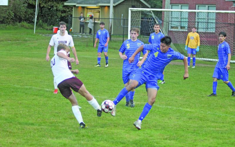 Photo by Christopher Smith/Staff A Highlands’ midfielder fights for the ball against Swain County, on Monday night.