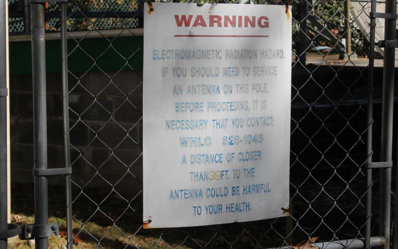 A sign posted on the fence outside the Big Bear Pen communication tower.