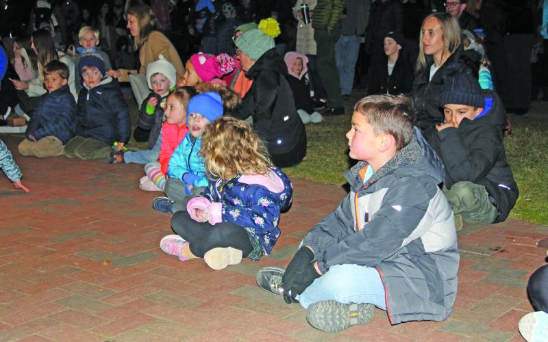 Children listening to the story of Christmas.