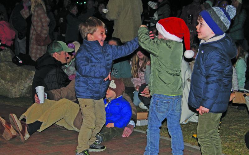 Children dancing in the park.