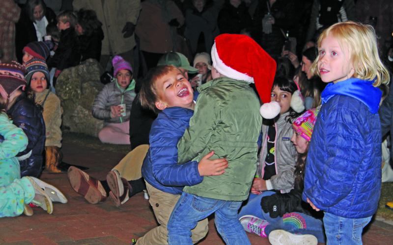 Children dancing in the park.