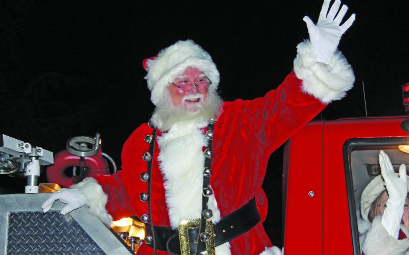 Santa Claus made his appearance on the back of a firetruck at Kelsey Hutchinson Founders Park on Saturday.
