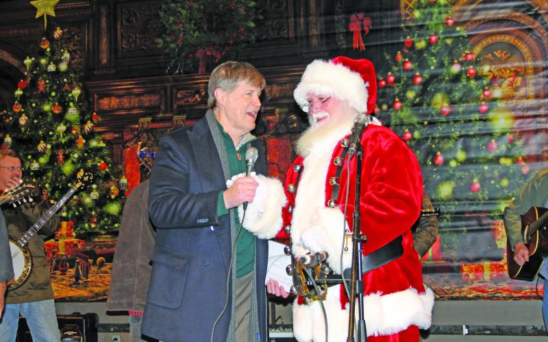 WHLC's Steve Day with Santa Claus.