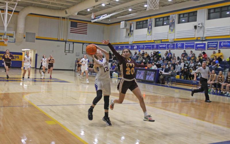 Photo by Christopher Lugo/Staff HHS senior Hayley Borino fights for a layup against Cherokee on Friday night.