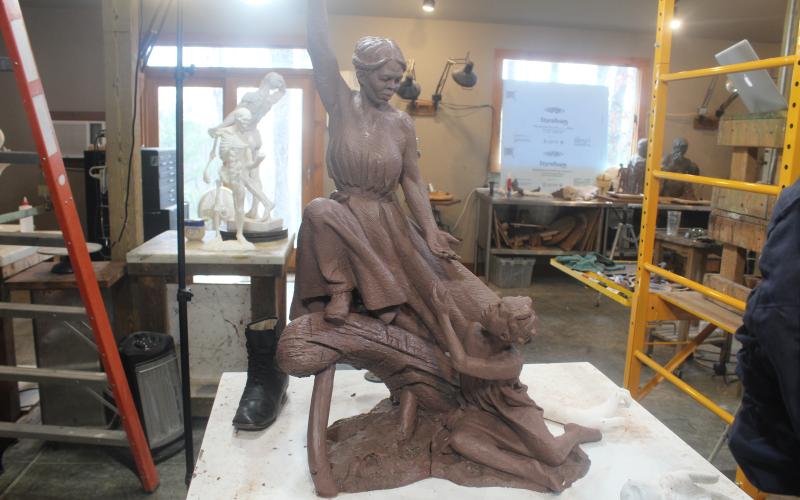 Wesley Wofford is the sculptor who created a 2,400-pound and nine-feet-tall statue portraying Harriet Tubman fighting against the wind to lead a slave girl on the Underground Railroad to freedom.