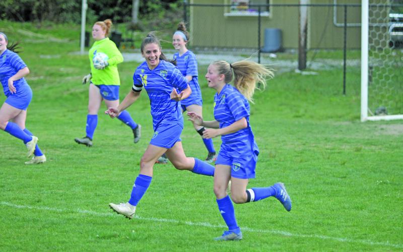 Photo by Christopher Lugo/Staff HHS seniors Julia Schmitt and Hayley Borino both had two goals on the night.