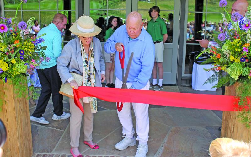 Photo by Christopher Lugo/Staff Owner of Old Edwards Inn Resort and Spa, Art Williams and his wife, Angela cut the ribbon to GlenCove.