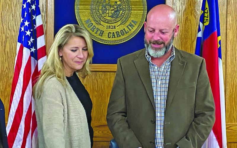 Allison Tate joined her husband commissioner Jim Tate to adjourn the board’s November meeting, his last.