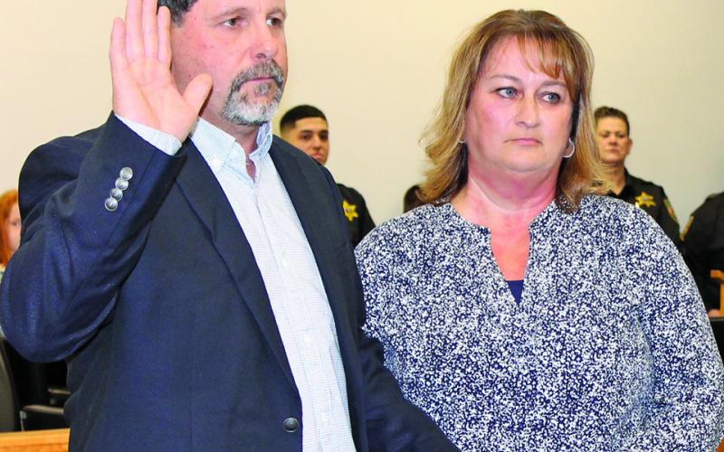 County commissioner John Shearl took his oath of office on Monday night.