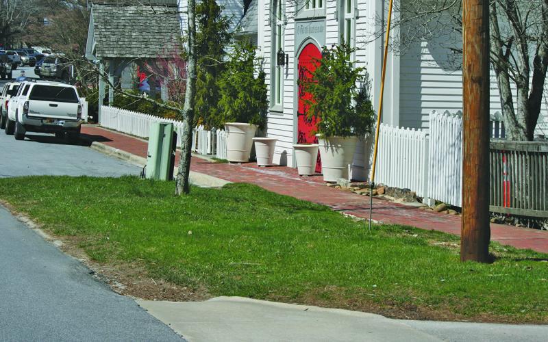 A plan to move two parking spaces led to a split vote by the Highlands Town Board.