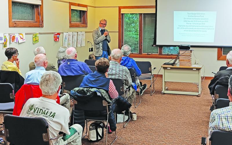 Highlands Mayor Pat Taylor discusses the recent property revaluation in Macon County during his “Coffee with the Mayor” program.