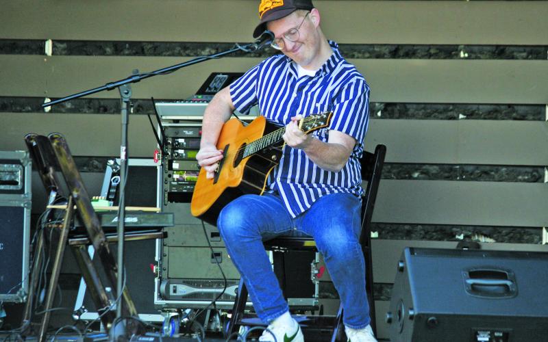 Lamont Landers plays during Porchfest at Kelsey-Hutchinson Founders Park.