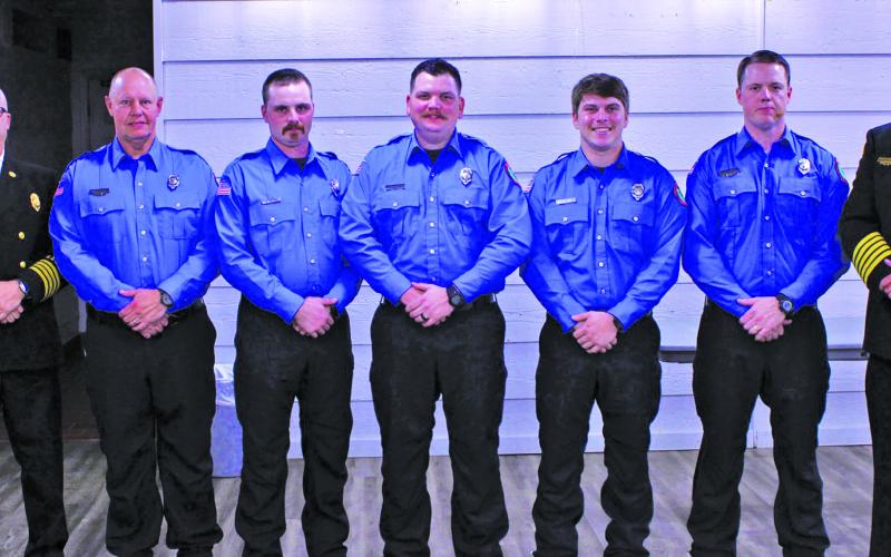 The five new full-time firefighters from Highlands Fire and Rescue were officially pinned on Thursday night during a town board meeting.