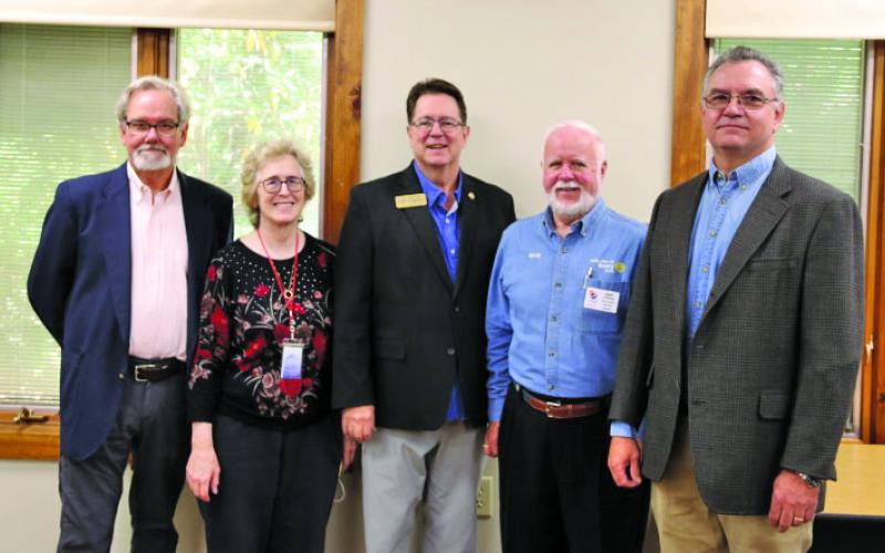 Highlands Mayor Patrick Taylor welcomed North Carolina Sen. Kevin Corbin and Rep. Karl Gillespie for a “Coffee with the Mayor” forum on Friday at Hudson Library. Pictured are Taylor, librarian Carlyn Morenus, Sen. Corbin, Rotary Club President Dave O’Hara and Rep. Gillespie.
