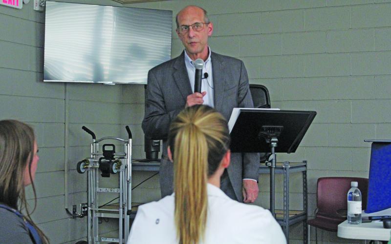 Ron Winters with Gibbons Advisors speaks during a forum in Cashiers.